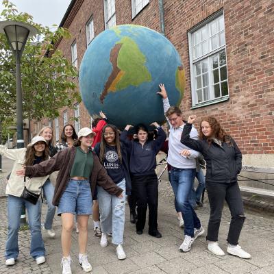 Students with a giant globe in Sweden, Summer 2022
